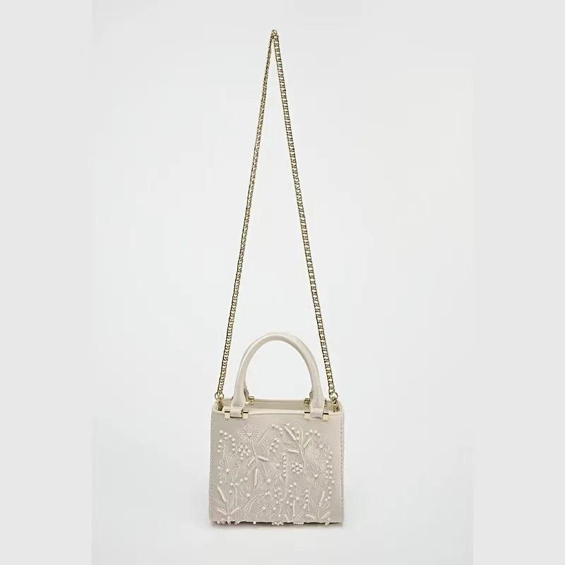 Bolsa Aurora Pérola | Bordado Delicado em Pérolas com Acabamento em Seda e Design Elegante para Festas