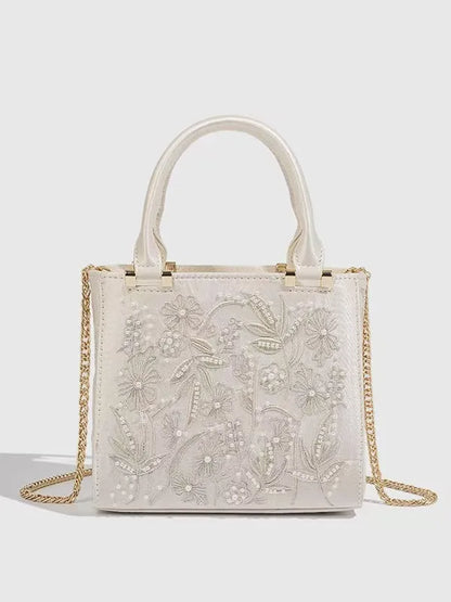Bolsa Aurora Pérola | Bordado Delicado em Pérolas com Acabamento em Seda e Design Elegante para Festas