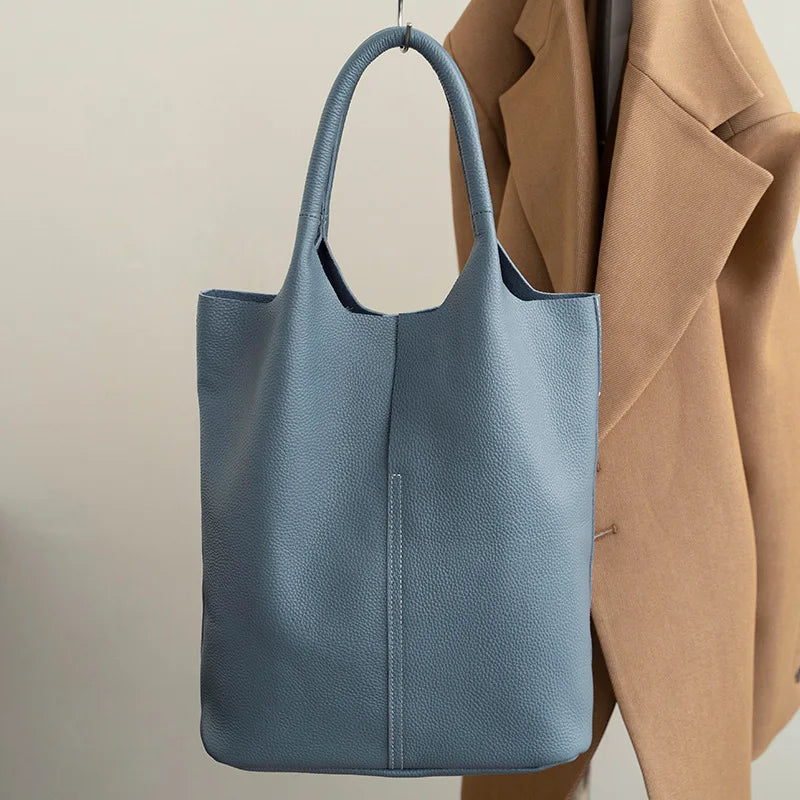 Bolso Miranda | Cuero vacuno suave con gran capacidad y diseño tipo bucket para el uso diario.